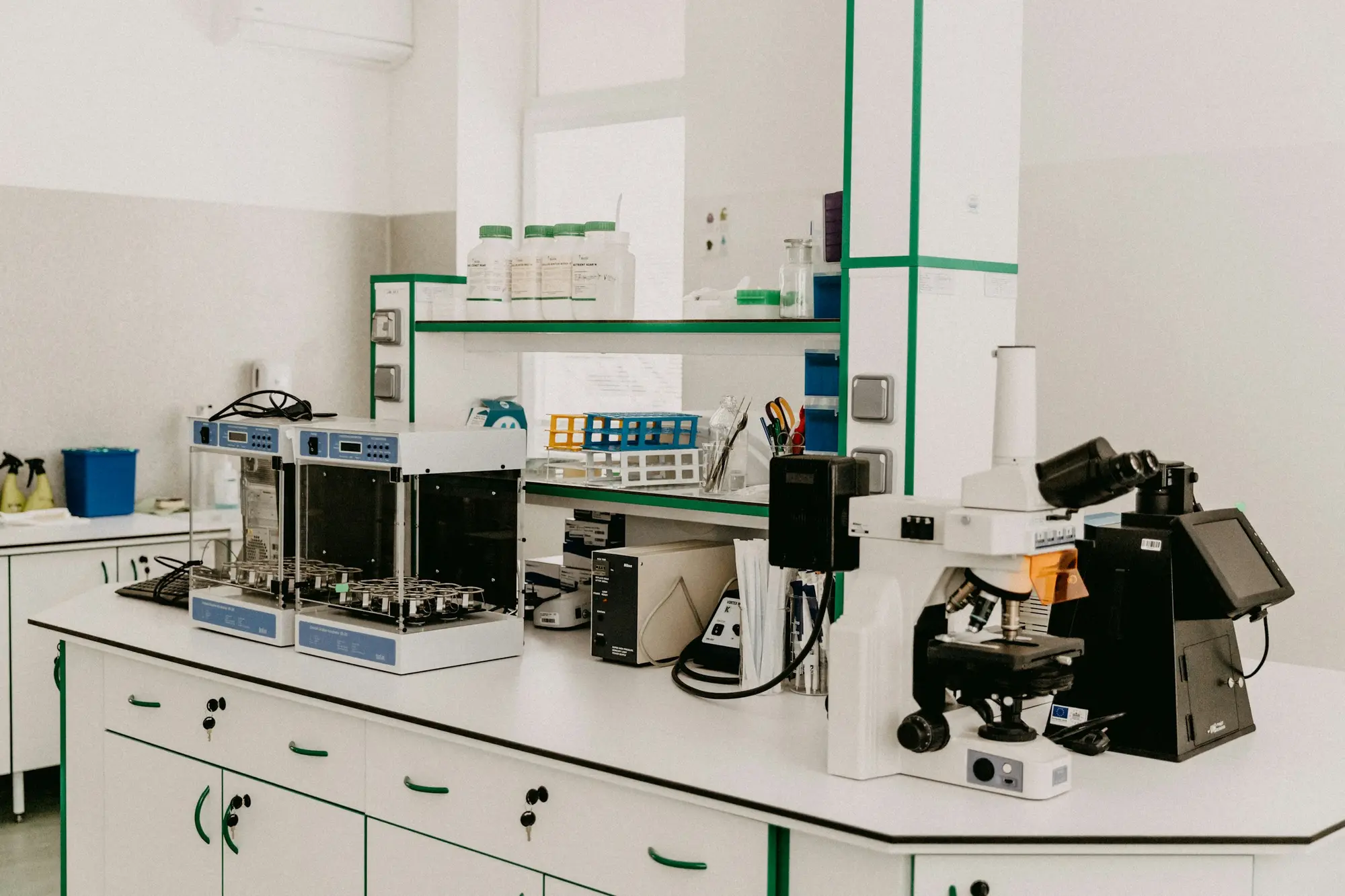Laboratory workbench with microscope and analytical instruments