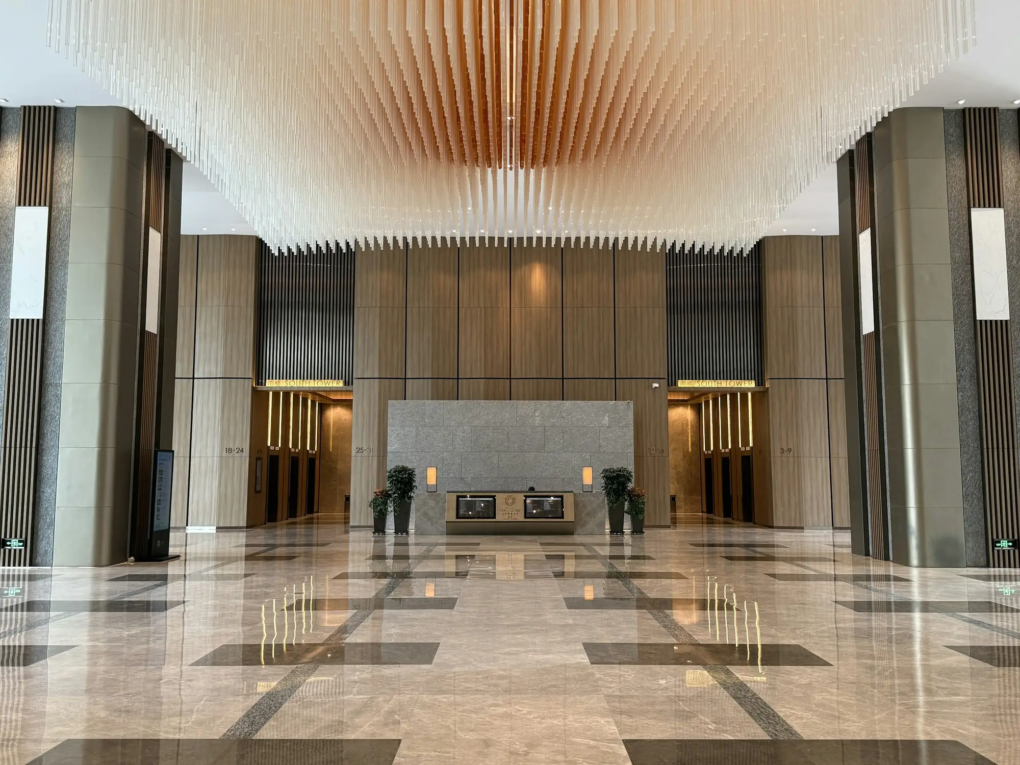 Polished marble floors in a bright commercial office lobby
